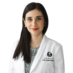 Female doctor in white medical coat.