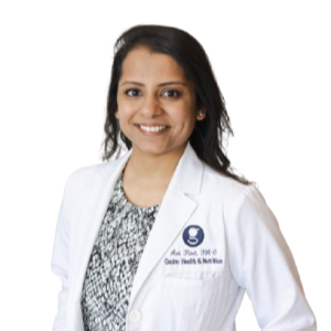 Smiling female doctor in white coat.
